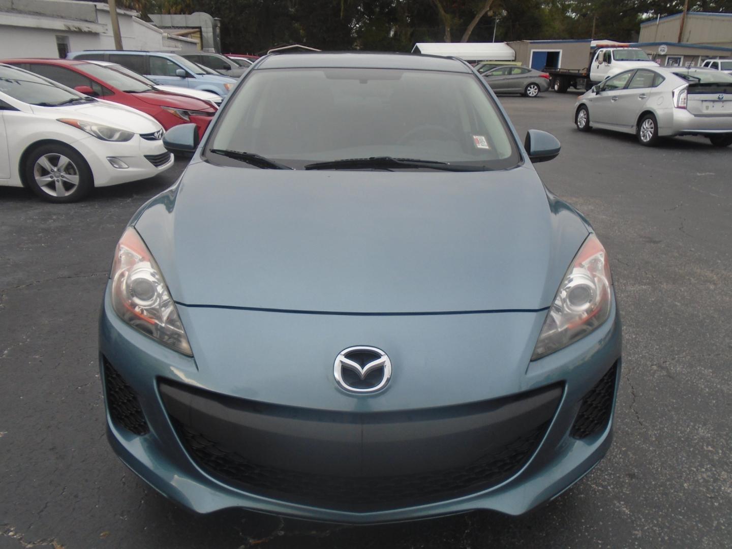 2012 Mazda MAZDA3 (JM1BL1UF0C1) , located at 6112 N Florida Avenue, Tampa, FL, 33604, (888) 521-5131, 27.954929, -82.459534 - Photo#1